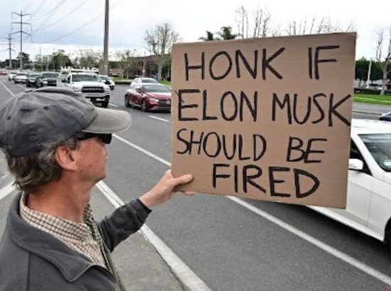 “We Can Get Back At Elon”: Anti-DOGE Protests Target Tesla Stores Across the US